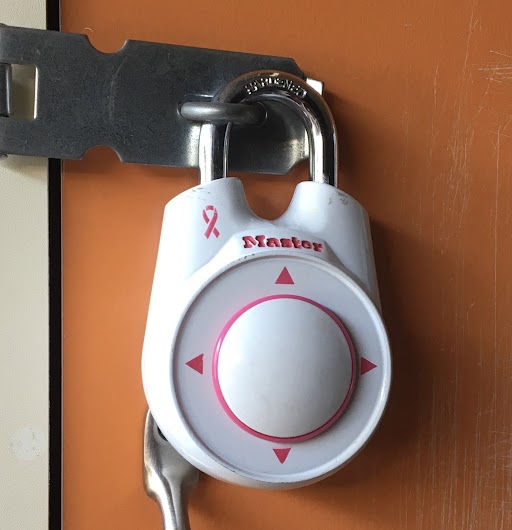 A directional padlock. The face can be moved up, down, left or right.